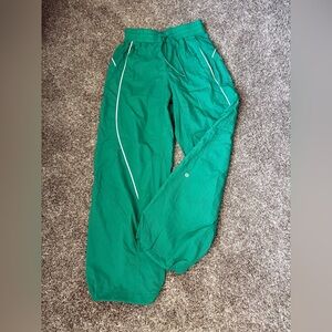 Lululemon Athletica light weight wind track pant size 4
